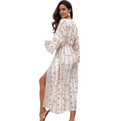 2025 Plus Size Swimsuit Coverup Dress Coastal Style Curvy woman in floral kaftan dress walking on tropical beach sunset